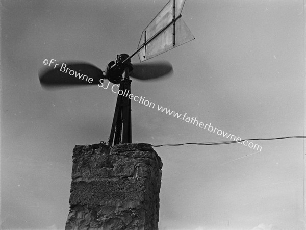 HOME-MADE WINDCHARGER (OLD AEROPLANE PROPELLOR) ERECTED BY FR. P.KILGALLON P.P.